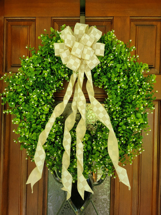 Straw backed greenery with bow 18 inch